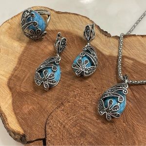 Matching set earrings ring and necklace with pendant